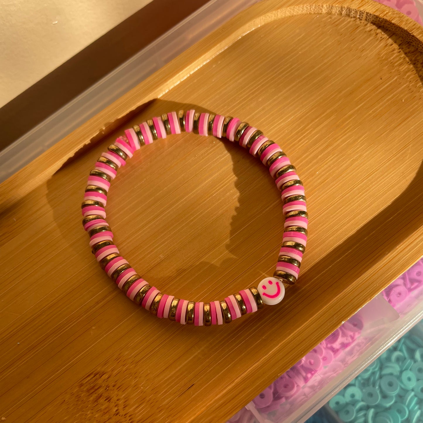 Pink and gold smiley