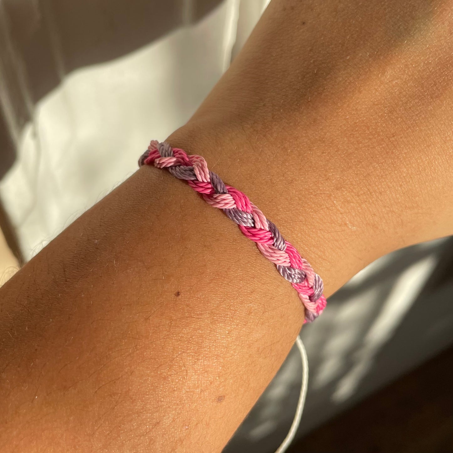 Pink and purple wax string bracelet